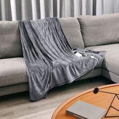 a couch with a blanket on top of it