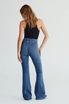 Forever flattering and flared jeans from our We The Free collection. **Fit:** Super high-rise, flared silhouette **Features:** Exaggerated yoking throughout, stretch denim fabrication, exposed button fly, flattering flat front and back **Why We | We The Free Jayde Flare Jeans at Free People in Medium Wash, Size: 32 All Jeans, Blue Fits, Flared Jeans, Bottom Clothes, Retro Inspired, Boho Outfits, Jeans Shop, Flare Jeans, Stretch Denim