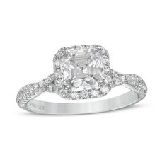 Start your happily ever after with this elegant diamond engagement ring from the Vera Wang Love Collection. Created in 14K white gold, this entrancing look showcases a 1 ct. certified Asscher-cut diamond - boasting a color rank of I and clarity of SI2 - wrapped in a cushion-shaped frame of diamonds. Shimmering diamond-lined twist ribbons grace the shank while set into the gallery are two princess-cut blue sapphires, the signature of the collection and a symbol of faithfulness and everlasting lov Wedding Rings With Emerald Cut Diamond Accents, Emerald Cut Rings With Diamond Accents For Wedding, Promise Diamond Ring With Radiant Cut And Diamond Accents, Promise Diamond Ring With Radiant Cut Accents, Promise Diamond Ring With Radiant Cut, Timeless Emerald Cut Diamond Wedding Ring, Wedding Fine Jewelry Halo Ring In Diamond White, Fine Jewelry Diamond White Halo Wedding Ring, Diamond White Halo Wedding Ring