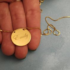 14k Solid Gold - Personalized Name - Engraved Necklace - Gold Round Necklace - Engraved Nameplate - 14k Name Necklace - 14k Solid Gold Name . . . . . . . . . . . . . . . . . . . . . . . . . . . . . . . . . . . . . . . . . . . . . . . . . . . . . . . . . . . . Looking for a thoughtful gift for your loved one? You will love this high quality 14k solid gold round name necklace. This is a perfect gift for your girlfriend or wife. Personalize it with her name in a beautiful font. This lovely solid go Dainty Stamped Pendant Jewelry, Etched 14k Rose Gold Jewelry, Etched Round Rose Gold Jewelry, Gold Plated Engraved Necklaces For Personalized Gift, Dainty Engraved Round Disc Jewelry, Classic Yellow Gold Necklace With Engraving Option, Engraved Nameplate Jewelry For Anniversary, Custom Engraved Gold Plated Nameplate Necklace, Personalized Engraved Gold-plated Necklaces