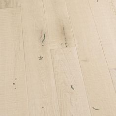 an image of white wood flooring that looks like it has been cleaned and is ready to be used