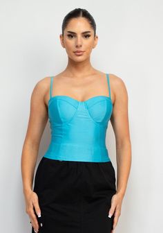 Sweetheart Corset-Like Cami Top Brand: Haute Monde Style: HMT56857 Fabric: 88% POLYESTER, 12% SPANDEX Details: A knit casual glamour top in solid color features a bustier corset-like bodice, sweetheart neckline, adjustable cami straps, and cropped length. Iris Tops Made in Cambodia. Fitted Blue Crop Top Tube Top, Trendy Party Top With Sweetheart Neckline, Blue Fitted Cropped Tube Top, Fitted Crop Top Tube Top, Fitted Crop Tube Top, Trendy Party Tops With Sweetheart Neckline, Trendy Top With Sweetheart Neckline For Party, Blue Cropped Fitted Tube Top, Trendy Sweetheart Neckline Top For Party