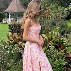 The beautiful floral print is part of what makes our 'Clarabelle' dress feel so romantic. It's cut from stretch cotton-rich fabric in a pink meadow print for a warm Spring and Summer like feel. 'Clarabelle' has a pretty trim to the corseted bodice that cinches and defines your waist perfectly. Pink Feminine Floral Dress With Ditsy Print, Feminine Pink Floral Dress With Ditsy Print, Pink Feminine Ditsy Floral Dress, Pink Ditsy Floral Print Dress For Spring, Pink Ditsy Floral Print Spring Dress, Feminine Floral Dress With Rose Print For Garden Party, Feminine Pink Dress For Garden Party, Feminine Pink Printed Floral Dress, Feminine Pink Floral Printed Dress