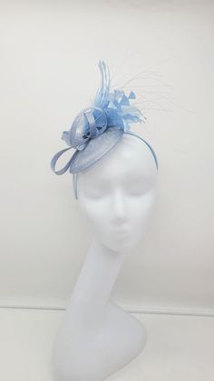 Elegant beautiful Light Blue Fascinator! Classic style to go with a variety of outfits: bridesmaids,  cocktail party,  Kentucky Derby, Rehearsal dinner, Easter and church outfits.  Ones with hair clip and headband. Also, comes in Hot Pink, red, blue, yellow, red, and other colors - Headband - Ready to ship  - Lightweight - Free Shipping - Fast shipping - Customize by adding different color flowers and or feathers Check my store for styles and colors.  Hatsandpearls.etsy.com Find more at my websi Cheap Fun Blue Hats, Blue Adjustable Fascinator For Summer, Adjustable Light Blue Fascinator For Royal Ascot, Adjustable Blue Fascinator For Summer, Adjustable Mini Hats For Royal Ascot Party, Adjustable Light Blue Fascinator For Spring, Adjustable Top Hat For Kentucky Derby Party, Adjustable Royal Ascot Costume Hats For Party, Blue Mini Hat Headband For Spring