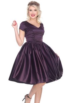 "Samples were made prior to 2016, ready to wear, made in USA,.   Evening Dress for Cocktails Mid Century style Color:  Dark Eggplant Purple Material:  Satin Size:  6 ~ Small Measures Bust 16\" fitting 32\" to 37\" and Waist 13\" fitting 25\"-27\" Very elegant color, perfect for holidays, Cocktails, Date Dinner or any reason to dress up,. Lots of gathers in the skirt, very heavy, short sleeves,   Retail price $150  Sale price Samples are final sales." Evening A-line Dress With Gathered Skirt, Satin Party Dress With Flared Skirt, Satin Dress With Flared Skirt For Party, Summer Satin Dress With Flared Skirt, Summer Flared Satin Dress, Fitted Party Dress With Gathered Skirt, Satin Evening Dress With Gathered Skirt, Evening Satin Dress With Gathered Skirt, Fitted Dress With Gathered Skirt For Party