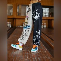 Length: 40.7” Waist Size: 29.1-42.5” Hip Size: 46.9” Thigh: 26.9” Multicolor Patterns Type: Graphic And Colorblock Type: Jogger Length: Long Regular Fit Elastic Waist Closure 95% Polyester 5% Elastane Streetwear Straight Leg Pants With Contrast Color, Straight Leg Pants With Contrast Color For Streetwear, Streetwear Cotton Pants With Contrast Color, Contrast Color Cotton Pants For Streetwear, Streetwear Cotton Bottoms With Contrast Color, Streetwear Color Block Cotton Bottoms, Color Block Cotton Bottoms For Streetwear, Cotton Bottoms With Contrast Color For Streetwear, White Patchwork Long Pants