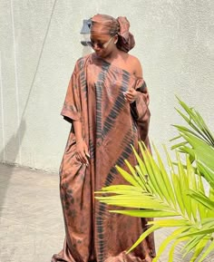 🎈This Nigerian Bubu Dress is made of high-quality adire silk (Nigerian tie-dye) that feels good on the skin. Look simple, yet sophisticated enough to steal all the attention in this gorgeous Kaftan. 🎈Details -Size: Loose fit customized to your size. This dress is made for you - 2 Side Pockets -Length 58 inches (can be adjusted to your desired length) -Neckline: Off Shoulder/ Slant Shoulder -100% West African Silk -Fabric is hand-dyed in Nigeria -Handmade in Nigeria - Soft on the skin & flowy - Bridesmaid Asoebi, Ankara Bubu Gown Styles, Ladies Party Wear, Bubu Dress, Party Wear Casual, African Kaftan, Boubou Styles For Women, Bubu Gown, Party Wear For Women