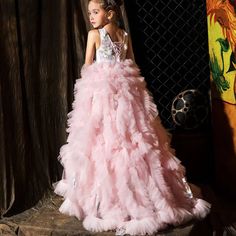 Indulge your little girl's royalty with our Dreamy Vow Pink Luxury Dubai Kids Girl Dress. This stunning ball gown features intricate Arabic appliques and tiered layers, perfect for weddings, parties, birthdays, or pageants. Give her the spotlight she deserves with this princess-worthy dress. Luxury Pink Princess Dress With Tulle Skirt, Luxury Pink Tulle Dress, Maternity Ball Gowns Pink, Princess Dresses Kids Ball Gowns Pink, Luxury Pink Whimsical Tutu Dress, Orange Evening Dresses, Yellow Evening Dresses, Silver Evening Dress, Grey Evening Dresses