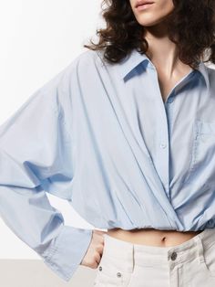 MO&Co. Women's Cotton Silk Cropped Shirt Offered in a soft blue and white hue, this shirt is made with a comfortable blend of cotton and silk. It's shaped in a cropped silhouette and stretchy hem for a stylish yet comfortable fit. Perfectly pairs with high-waisted shorts or pants. Features : - Regular fit, cropped- Elasticised hem, pointed collar- Soft touch, made from cotton and silk Code: MBD2SHTT53The back length of size S is 52cmMATERIALS & CARE Material: 59.1% Cotton 40.9% SilkREMINDER: All Blue Shirt With Shirttail Hem For Spring, Blue Cotton Blouse With Shirttail Hem, Blue Blouse With Shirttail Hem For Daywear, Blue Cropped Blouse For Work, Cropped Blue Blouse For Work, Chic Blue Blouse With Shirttail Hem, Blue Workwear Top With Shirttail Hem, Blue Blouse With Relaxed Fit And Shirttail Hem, Relaxed Fit Long Sleeve Cropped Shirt For Spring