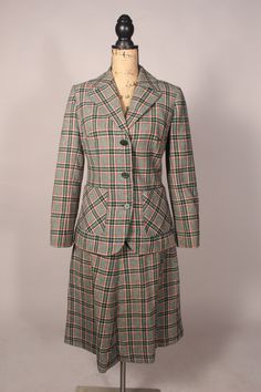 Pendleton // Skirt Suit Fabulous vintage 60's 70's green and red plaid skirt suit by Pendleton!  This gorgeous suit is in beautiful condition, is fully lined, and such a great plaid!   Bust:36" Waist: jacket-32"; skirt-26" Hips:42" Length: jacket-27"; skirt-27" Sleeve:22" Label:  Pendleton 10 Pure virgin wool made in USA (Please check measurements) 1776 Fitted Green Skirt Suit For Fall, Vintage Long Sleeve Single Breasted Skirt Suit, Vintage Single-breasted Long-sleeve Skirt Suit, Retro Plaid Full Skirt, Retro Plaid Lined Skirt, 1970s Plaid Skirt, Plaid Wool Skirt, Red Plaid Skirt, Vintage Suits