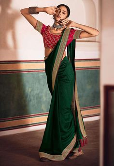 Green silk saree with blouse 21029 Desc: Color : Green Saree Fabric : Silk Wash Care : Dry clean Sleeve Style : Short Sleeve Long Sleeves : Done only in Custom Stitch Sleeves Lining : Done only in Custom Stitch Bust Size : 32 to 42 Inches Occasion : Festival Diwali Eid Durga Pooja Ganesh Charturthi Dussehra. With Express Free Shipping Buy Indian Party wedding wear Bridal saris Green silk saree with blouse 21029 online in USA, UK and Canada from KollyBollyEthnics.com Skirts Collection, Dhoti Saree, Resham Embroidery, Crepe Saree, Satin Saree, Designer Sarees Online, Green Saree, Party Kleidung, Art Silk Sarees