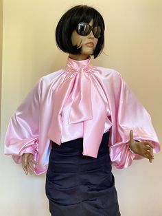 "This is a very stylish Womens Satin blouse. It is comfortable and cozy. Made for a free flowing fit. Great for all year around and for any special occasion or casual day can be dressed up or dressed down. SIZE CHART SIZE S - US 6, UK 8, EU 36 bust: bust around 34.5\"/90cm Waist: waist around 27.5\"/70cm Hips: hips around 34.5\"/90cm SIZE M - US 8, UK 10, EU 38 bust: bust around 37.5\"/95cm Waist: waist around 29.5\"/75cm Hips: hips around 37.5\"/95cm SIZE L - US 10, UK 12, EU 40 bust: bust arou Feminine Tie Neck Top For Evening, Glamorous Pink Blouse For Fall, Pink Long Sleeve Glamorous Blouse, Elegant Pink Tops For Evening, Pink Bow Top For Fall, Elegant Pink Blouse With Blouson Sleeves, Feminine Party Blouse With Bow, Pink Blouse With Blouson Sleeves For Fall, Glamorous Long Sleeve Pink Blouse