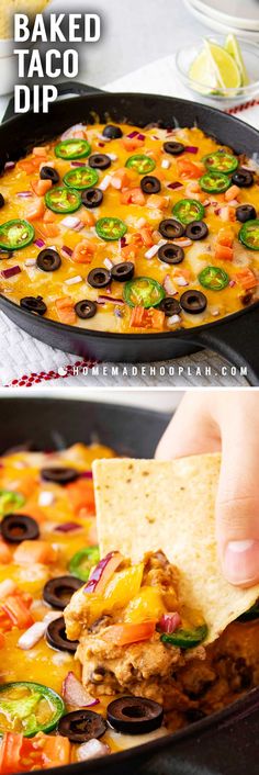 a person dipping tortilla chips into a skillet filled with baked taco dip