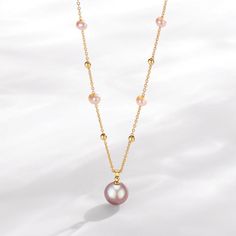 Fall in love with House of Pearls’ timeless, classic teardrop pendant necklace. Crafted from 14K gold-filled metal and freshwater pearls, this piece is perfect for a night out or day in. The white and purple pearls have a unique and special hue that will make anyone stop, stare, and ask where you got it. Get your hands on this best-selling necklace and make a statement every time you wear it. 14k Gold Filled Freshwater Pearl Necklace This glamorous necklace features shimmering white freshwater p Gold Teardrop Akoya Pearl Necklace, Gold Akoya Pearl Teardrop Necklace, Gold Drop Pearl Pendant Necklace, Rose Gold Akoya Pearl Necklace With Pearl Drop, Teardrop Akoya Pearl Necklaces With Pearl Chain, Akoya Pearl Teardrop Necklaces With Pearl Chain, Teardrop Akoya Pearl Chain Necklaces, Purple Pearl Drop Necklaces, Gold Pearl Teardrop Pendant Necklace