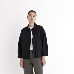 A shirt jacket with a utilitarian touch. Features a paneled construction, spread collar, and button placket. The design is anchored by two oversized gusseted side pockets. Relaxed fit. A staple for transitioning seasons. + Details Color: Black 55% Linen, 45% Cotton XS, S, M, L, XL Julie is 5'9" and wearing a size S Junho is 6'0" and wearing a size S Hand wash cold, lay flat to dry. Do not tumble dry. Can be dry cleaned. + Material A mid-weight woven 55% Linen, 45% Cotton material. This material Knitwear Dress, Pocket Jacket, Pocket Shirt, Shirt Jacket, Cotton Material, Relaxed Fit, How To Wear, Black, Design