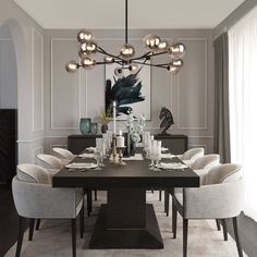 a dining room table with chairs and a chandelier