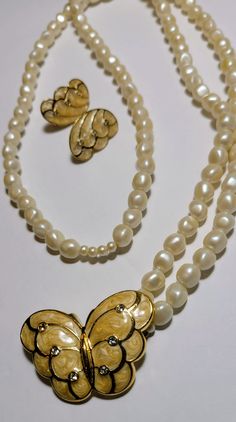 Kenneth Jay Lane for Avon butterfly double strand necklace and post earrings. Faux pearl, gold tone, and enamel Vintage Gold Jewelry With Butterfly Clasp, Vintage Gold Butterfly Jewelry, Double Strand Necklace, Double Ring, Kenneth Jay Lane, Jewellery Sets, Strand Necklace, Post Earrings, Faux Pearl