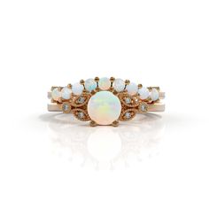 Set Opal engagement ring opal and diamond October birthstone 14k rose gold gold 2mm Matching Wedding Band Women White opal engagement ring with lovely diamonds, set in 14k solid gold. ► FEATURES; Gemstones: natural opal : 9 x2mm opal Gemstones: natural opal : 5mm , diamond: 6x1 mm total diamond carat weight: 0.03 (color H; clarity VS) Material options: 14k rose gold, 14k yellow gold, 14k white gold Size: all ring sizes are available How to Order: Please select your preferred size and material fr White Opal Stackable Promise Rings, White Opal Stackable Rings For Promise, White Opal Stackable Round Rings, White Opal Stackable Rings, White Stackable Round Opal Ring, White Stackable Opal Ring, White Stackable Opal Jewelry, Heirloom White Opal Gemstone Ring, White Opal Birthstone Ring With Round Band