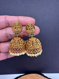 Matte Goddess Lakshmi Nakshi Jhumka Earrings Very pretty gold look alike Earrings Length : 1.75 Inches; Weight : 13 grams each Ready to ship from Boston, MA Gold Jhumkas, Temple Jewelry, Earrings Indian, Traditional Earrings, Green Stones, Goddess Lakshmi, Indian Earrings, Gold Earrings Designs, Jhumka Earrings