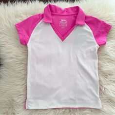 Very Cute Golf Shirt For A Little Girl. This Top Would Also Be Great For Tennis Or Another Athletic Sport Or Event. New With Tags! It Is Mainly White On The Front With Pink Accents On The Sleeves, Collar And The Back. The Pink Has Silver Metallic Dots On It As Well. V-Neck. Hydro-Dri Technology Keeps You Dry By Wicking Away Moisture. Has Upf 30 Protection. 100% Polyester Armpit To Armpit- 13 1/4” Waist- 13” Shoulder To Bottom- 17 3/4” Let Me Know If You Have Any Questions. Make Me An Offer!! Sporty Fitted Tops For Playwear, Sporty Pink Top For School, Sporty Pink Tops For School, Sporty Stretch Tops For School, Cute Golf, Boys Golf, Polo Long Sleeve, Blue Polo Shirts, Navy Blue Shorts