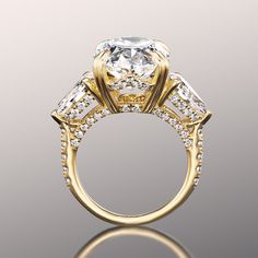 a three stone diamond ring on a reflective surface