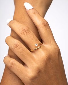 The definition of beauty in simplicity. The Liana Ring is a refined & dainty piece crowned with a timeless white zirconia stone. A minimalist treasure where the effortless elegance shines in itself. A harmony of delicacy and character in an ethereal and bright adornment. 18k Gold Vermeil White Zirconia stone Adjustable Hypoallergenic & non-tarnish Style Tips: The Liana Ring is a fine beauty worn on its own but to amplify the class, wear it with our Hazel Ring and Yumi Bracelet, for a ref Rings Aesthetic Gold Simple, Minimalistic Rings Aesthetic, Gold Ring Minimal Design, Minimalist Gold Rings With Timeless Design, Minimal Gold Rings Aesthetic, Vogue Jewelry, Engagement Rings Couple, Fancy Jewelry Necklace, Gold Rings Fashion