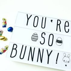 a sign that says you're so bunny with some candy in front of it