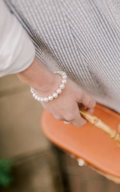 Add a touch of class to any outfit with this elegant freshwater pearl bracelet just like style expert Kelly Larkin of Kelly in the City did. This everlasting bracelet features 7 1/2″ of 8-8.5mm cultured freshwater pearls that have been hand-matched for quality, luster and sheen. Secured by a 14k white gold clasp, this gorgeous bracelet is timeless. Luxury Pearl Charm Bracelet For Anniversary, Luxury Classic Pearl Wedding Bracelet, Luxury Single Strand Pearl Bracelet, Elegant Style, Affordable Pearl White Bracelet For Gifts, Luxury Formal Pearl Bracelet With Sterling Silver Clasp, Luxury White Pearl Bracelet Timeless Style, Cheap White Pearl Chain Bracelet, Luxury Timeless Pearl Bracelet As A Gift, Elegant Single Strand Luxury Pearl Bracelet