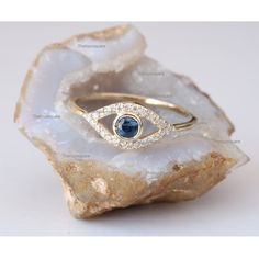 This Ring Made in Solid 14k Yellow Gold Dainty Evil Eye Design Ring. Genuine Blue Sapphire Gemstone With Natural Diamonds Handmade Jewelry. Also available in Rose Gold, White Gold and Yellow Gold. ★Details ★Purity : Solid 14k Gold ( Also available in 9k & 18k Solid Gold) ★Metal : Yellow Gold ( Also available in Rose Gold & White Gold) ★Gemstone : 100 % Genuine Blue Sapphire ( Also available in Other Gemstone) ★Stone Weight : 0.20 Ct Approx ★ Natural, White Diamonds ★ Diamonds Clarity : SI ★Diamo Oval Blue Diamond Ring With Pave Setting, Blue Diamond Ring With Pave Setting, Blue Topaz Jewelry With Pave Setting For Anniversary, 14k Gold Jewelry With Blue Diamond Accents, 14k Gold Blue Jewelry With Diamond Accents, 14k Gold Blue Sapphire Ring With Halo Setting, 14k Gold Jewelry With Diamond Accents In Blue, Blue Sapphire Ring With Halo Setting In 14k Gold, Blue Diamond Birthstone Ring With Diamond Accents