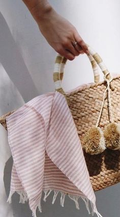 Our St Tropez tote is made of natural seagrass and features matching raffia poms poms. Roomy enough for your beach towel, sunglasses and more. Measurements: 17.5" W x 9.5" H x 5.5" D FINAL SALE Casual Summer Beach Bag For Poolside, Casual Summer Poolside Beach Bag, Chic Spring Beach Bag, Chic Straw Beach Bag For Summer Outings, Coastal Style Summer Beach Bag, Handwoven Pink Beach Bag For Summer, Pink Handwoven Beach Bag For Summer, Chic Beach Bag For Summer Outings, Trendy Summer Beach Bag For Poolside