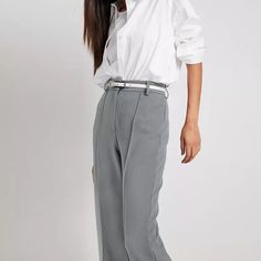 Discover Timeless Elegance and Comfort Step into a world of sophisticated style with our High Waist Pleated Wide Leg Trousers, designed to elevate your wardrobe in any season. Perfect for the modern woman, these trousers blend classic elegance with contemporary fashion, making them an essential addition to your office or casual attire. Product Features All-Season Wear: Crafted for versatility, these trousers are suitable for year-round comfort and style. Flattering High Waist Design: The high waist cut accentuates your figure, offering both style and comfort. Elegant Pleated Front: The pleated front adds a touch of sophistication, making these trousers perfect for both office and casual settings. Solid Pattern & Button Detailing: The solid color and chic button detailing enhance the trouse Trousers For Women, Middle Aged Women, Pantalon Large, Casual Attire, Contemporary Fashion, Sophisticated Style, Classic Elegance, Wide Leg Trousers, Modern Woman