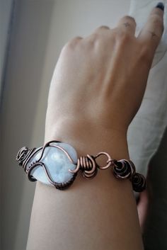 This antiqued copper  chain bracelet has been accurately crafted one link at a time. The bracelet has secure handmade hook clasp. The chain is extremely strong and durable due to the type of links I chose for this bracelet. This lightweight moonstone bracelet are a lovely addition to any wardrobe. It is suitable has an elegant, rustic look to it. This is really striking bracelet for every occasion. This moonstone copper bracelet is formed using traditional wire wrapping techniques and has been oxidized to give it a more antique look. I will cover it with special lacquer for metals. That will help to keep this bracelet bright for a long time. Material: Pure Copper (100%) Moonstone Gemstone Adjustable Copper Wire Bangle Bracelet, Adjustable Copper Wire Bangle, Handmade Copper Wire Bangle Bracelet, Bohemian Bangle Bracelet In Copper Wire, Adjustable Bronze Copper Bracelets, Bohemian Copper Wire Bangle Bracelet, Handmade Metal Crystal Bangle Bracelet, Handmade Adjustable Rose Gold Chain Bracelet, Adjustable Hand Wrapped Copper Wire Bracelets