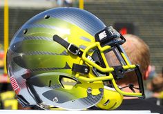 a football helmet sitting on top of a table