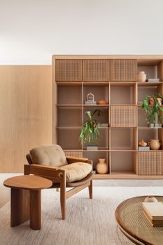 a living room filled with furniture and shelves