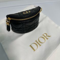 Has A Cannage Topstitching And Has A Compact Design That Can Hold Keys And Coins. You Can Attach This Purse On The Strap Of A Bigger Bag Or You Can Slip It Into A Pocket. You Can Also Attach It To Your Belt To Finish Your Outfit. Vintage Dior Bag, Dior 2020, Monogrammed Duffle Bag, Travel Clutch, Cosmetic Bag Organization, Pink Pouch, Purple Handbags, Dior Book Tote, Duffle Bag Travel