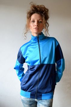 Blue workout jacket, Vintage jacket, Color block running jacket, Men outdoor jacket, Sport outerwear,Outdoor sportswear,Blue windbreaker,S/M Blue vintage sport jacket made in Finland. It has two side pockets with zipper closure and turtle neck what will protect you if it's windy outside. Dark and light blue color blocks will make your look more interesting and workouts or any activities more fun! Size: seems like women (M) and men (S) PLEASE CHECK ALL MEASUREMENTS BELLOW: Length: 63 cm/ 25" Shou Affordable Blue Nylon Windbreaker, Cheap Vintage Blue Windbreaker, Jacket Runway, Outdoor Sportswear, Blue Windbreaker, Jacket Sport, Fashion 70s, Character Fashion, Vintage Sport