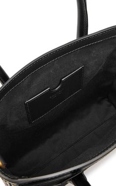 Cotton canvas top handle bag in black. Buffed calfskin trim throughout.Twin rolled carry handlesAdjustable and detachable shoulder strapLogo printed in white at faceLogo pattern printed at sidesCard slot at interiorTwill liningH 9" x W 9.5" x D 3"Supplier color: Black/WhiteTextile, calfskin.Made in Italy. Designer Black Satchel With Round Handle, Black Round Handle Business Bags, Black Luxury Coated Canvas Satchel, Luxury Black Coated Canvas Satchel, Coated Canvas Satchel With Leather Trim And Top Handle, Top Handle Satchel With Leather Trim And Coated Canvas, Black Top Handle Shoulder Bag In Coated Canvas, Modern Top Handle Satchel In Coated Canvas, Modern Top Handle Coated Canvas Satchel