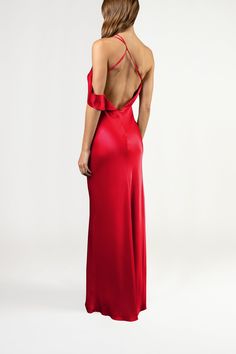 the back of a woman in a red dress