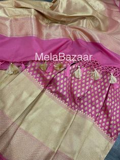 Glamorous Banarsi saree in rogue pink with gold zari butas all throughout and tassels on the palla Fall attached. Matching blouse fabric included. Note: The color of the products may slightly vary according to the ambient lighting conditions and the color calibration of LED devices. If you would like more clarity before your purchase, please drop us a message . Banarsi Saree, Net Dupatta, Of Sarees, Color Calibration, Blouse Fabric, Gold Design, Tassels, Art Collection, Dress Outfits