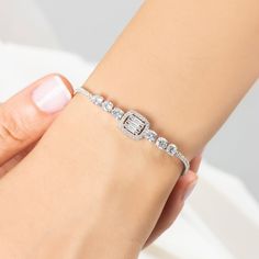 Beautifully crafted Silver Baguette CZ Diamond Cut Bracelet is the unique one of our tennis bracelet collection. Baguette Tennis Bracelet is made from high quality 925 solid sterling silver and multishaped and cutted white cubic zirconia stones. Elegant piece of our collection is available for daily using and for the classy events. This piece definitely will be the perfect match to your outfit and great gift idea for every special day. Baguette Cut Tennis Bracelet will add elegance to you and your loved ones.  This adorable Sterling Silver Baguette CZ Diamond Cut Tennis Bracelet jewelry is what you're looking for. * Material: High Quality Solid 925 Sterling Silver * Finish: Sterling Silver  * Chain: Adjustable 3 cm Extension * Gemstone: High Quality White Cubic Zirconia Stones PACKAGING IN Silver Chain Bracelet Women, Bracelets Tennis, Christmas Gift For Women, Bracelet Tennis, Diamond Jewelry Necklace, Jewelry Christmas, Diamond Chain, Valentines Jewelry, Bracelet Collection