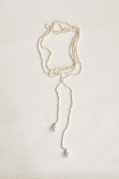 Keshi pearls are anchored by unique freshwater pearl focal drops— a regal and romantic accessory to define your bridal moment.

#bridalstyling #personalstylist #whattowear #grwm #stylingadvice #wedding #bridal #modernaesthetic #style #womensfashion #womenstyle Elegant Pearl White Backdrop Necklace With Pearl Drop, Elegant Pearl Backdrop Necklace With Pearl Drop, Adjustable Pearl Chain Necklace For Formal Occasions, Elegant Baroque Pearl Lariat Necklace, Timeless Pear-shaped Wedding Necklace, Pearl White Lariat Pearl Necklace, Adjustable Pearl Charm Necklace For Formal Occasions, Elegant Pearl Lariat Necklace, Timeless Drop Jewelry For Wedding