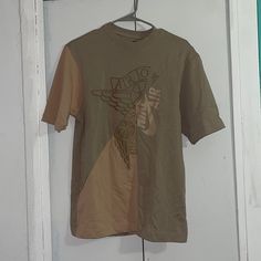 Size Mens Xs Brand New Never Worn Brown Short Sleeve Shirt For Streetwear, Casual Beige Shirt With Graphic Print, Casual Beige Graphic Print Shirt, Casual Brown Shirt With Graphic Print, Olive Cotton Short Sleeve Shirt, Graphic Tee For Streetwear In Khaki, Khaki Graphic Tee For Streetwear, Khaki Cotton T-shirt For Streetwear, Casual Beige Shirt For Streetwear