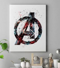 the avengers symbol is painted in red, white and blue on a wall above a shelf