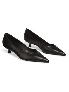 Set on a kitten heel, Stuart Weitzman's Eva pumps flaunt a V-cut pointed toe. Point toe Slips on Polyurethane/leather upper Leather lining Leather/TPU sole Made in Spain SIZE Kitten heel: about 1.5 (35mm) ABOUT THE BRAND Kitten Heel Pumps, V Cut, V Cuts, Kitten Heel, Stuart Weitzman, Kitten Heels, Leather Upper, Spain, Slip On