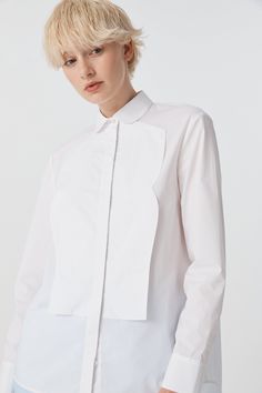 Boasting confidence and style, this uniquely designed shirt is a play on the classic dinner-shirt, with tuxedo style collar and front lapels. This long sleeved shirt has a concealed front button opening with a beautiful pearl button at the top of the placket. The back of the shirt has an inverted pleat for ease of wear. Relaxed fit silhouette. Model is wearing a Size AU 8 CARE INSTRUCTIONS Main: Cotton Wash separately with delicate cool hand wash in mild detergent Do not bleach, soak, or tumble Open Collar Shirt, Garment Care Labels, Tuxedo Style, Pleated Shirt, All Heart, Shirt Detail, Long Sleeved Shirt, Online Fashion Boutique, Wedding Outfits