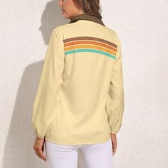 • Embrace the 70s with our 70s Style Top Women, a chic addition to your retro wardrobe.• This Beige Retro Stripe Top Women features a unique upper chest retro stripe print pattern in orange, brown, yellow, and turquoise.• Made from 100% polyester, this Vintage Style Blouse offers comfort and durability.• With its solid contrasting brown collar and elastic cuffs balloon sleeves, this Retro Top Women exudes vintage charm and style.Designed in California by Trendy Hip buys. Handmade to order from. overseas.100% polyester. Retro Beige V-neck Top, Retro Long Sleeve Spring Tops, Retro Long Sleeve Tops For Spring, Vintage Fashion Tops For Spring, Retro Long Sleeve Brown Blouse, Retro Long Sleeve Blouse For Vintage Fashion, Retro Long Sleeve Top With Retro Print, Retro Collared Top For Fall, 70s Inspired Long Sleeve Blouse For Fall