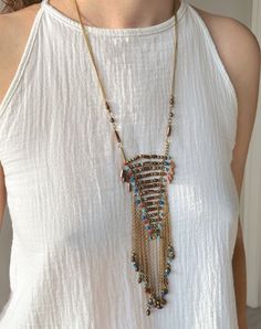 This Handmade Ethnic Necklace is a very unique beaded jewelry, which is going to be yours if you are here.  Its ethnicity and elegance comes from the traditional tribal ethnic design and boho minimalist string structure. It is designed and produced by local shaman artisans. Shamanism is known as a nature worship belief. Shamans bound their soul with nature. Our necklace is designed and is became alive with this bound. If you would like a distinctive, unique, ethnic and dainty necklace, Zoho Acce Bohemian Long Necklace For Festive Occasions, Bohemian Beaded Beads For Jewelry Making, Bohemian Necklace With Colorful Beads For Festive Occasions, Bohemian Long Necklace With Dangling Round Beads, Unique Long Beaded Necklaces With Dangling Beads, Unique Long Beaded Necklace With Dangling Beads, Festival Beaded Necklaces With Tassels And Round Beads, Long Beaded Festival Necklaces With Dangling Beads, Festival Long Beaded Necklaces With Dangling Beads