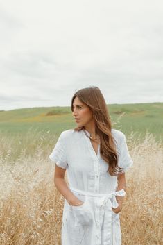 Beautiful Structured dress in a french linen fabric. Lined with shell buttons. Features front pockets and side slits on both legs. Such an easy breezy throw on and go piece for summer. Sizing Details: One size. Fits most comfortably between US sizes 2-10 Care Instructions: Gentle wash on cold and hang to dry. A steam is the best way to get wrinkles out of your linen. Structured Dress, Between Us, Shell Buttons, French Linen, Easy Breezy, Linen Dress, Rosemary, Linen Fabric, Wrinkles