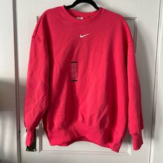 Nike Phoenix Crewneck Sweatshirt. Pink Color. Size Medium. Fits Over Sized. Still Has The Sticker Tag Attached, But Does Have A Whole Shown In Photos 5 & 6. Overall, Good Condition. Tops Nike, Pink Nike, Over Sized, Nike Pink, Pink Sweatshirt, Nike Tops, Christmas List, Pink Color, Crewneck Sweatshirt