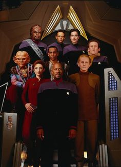 the cast of star trek into space posing for a photo